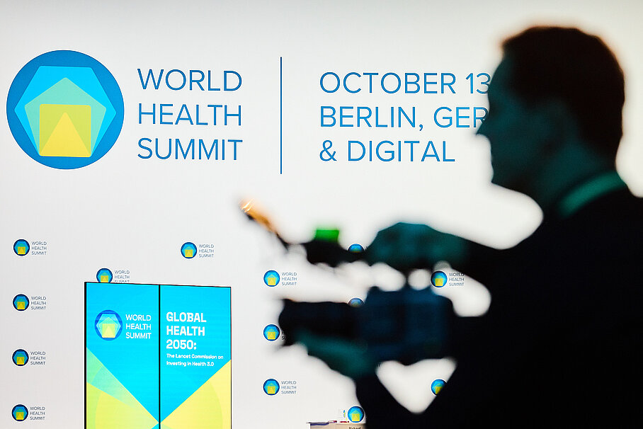 World Health Summit past years logo and crowd